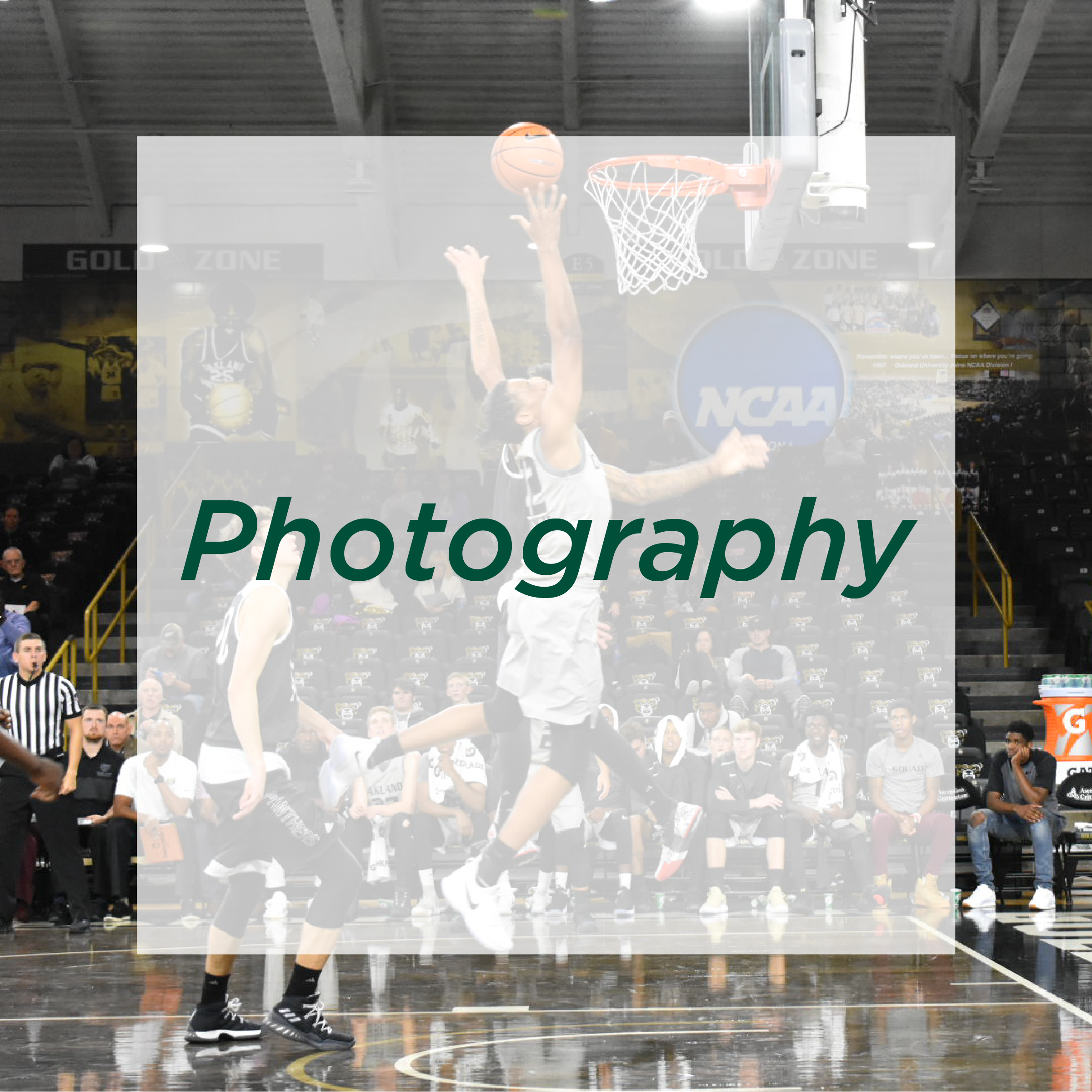 two basketball players in the air aiming for the basket